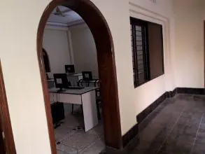 A view through the archway into one of the centre's rooms