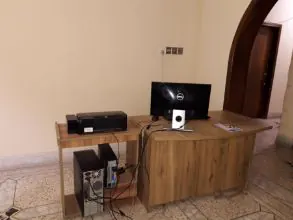 A workstation and printer at the centre